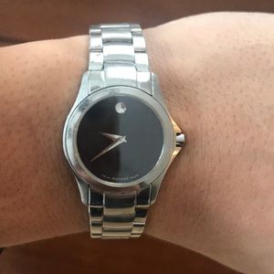 Women’s movado watch. Black w/stainless steel band